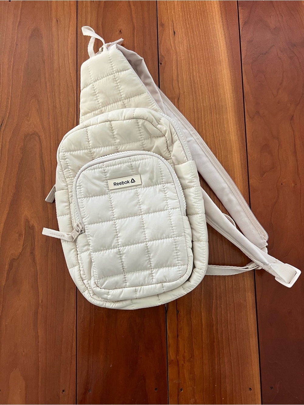 Reebok Quilted Cream Sling Bag for Men—like new!